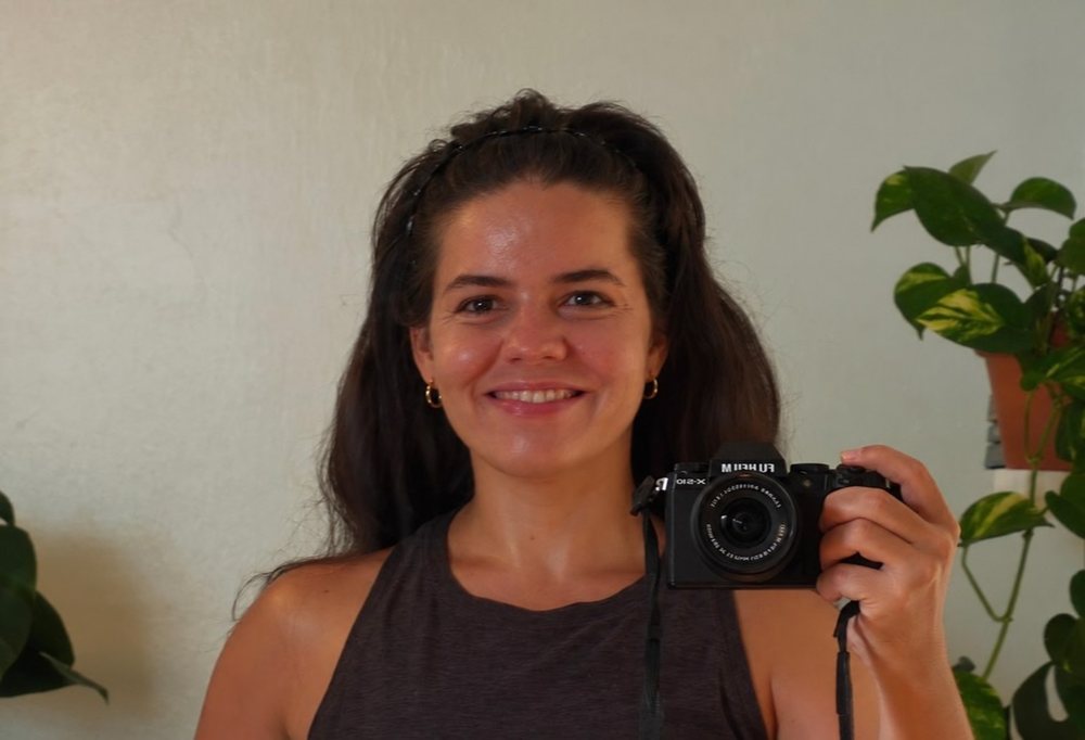 Rachella holding her camera